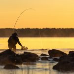 photo credit: VisitLakeland Fisherman on river mouth in Nurmijoki river via photopin (license)