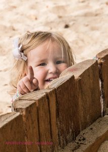 photo credit: tbeckeryvr <a href="http://www.flickr.com/photos/155731783@N06/45147143164">young child laughs at wood fence</a> via <a href="http://photopin.com">photopin</a> <a href="https://creativecommons.org/licenses/by-nc-nd/2.0/">(license)</a>